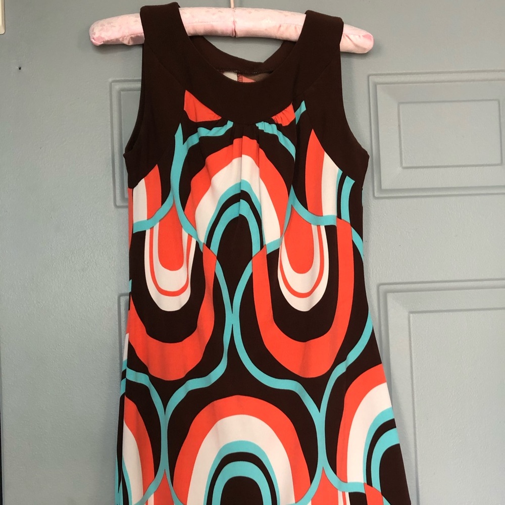 Colorful long blouse or short dress.